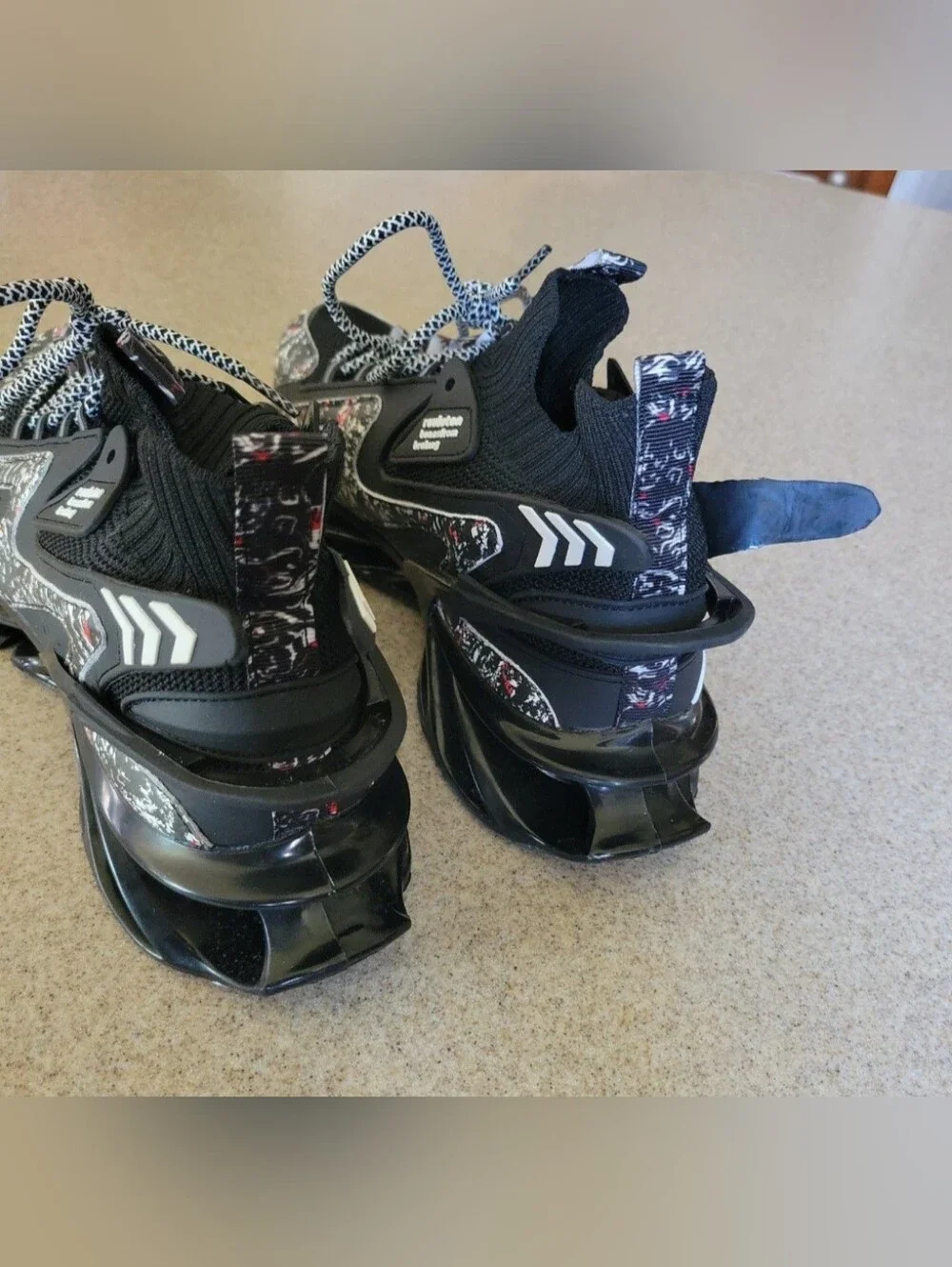 Reuluton Beansfrom Breking Blades Futuristic Looking Sneakers Black Grafiti